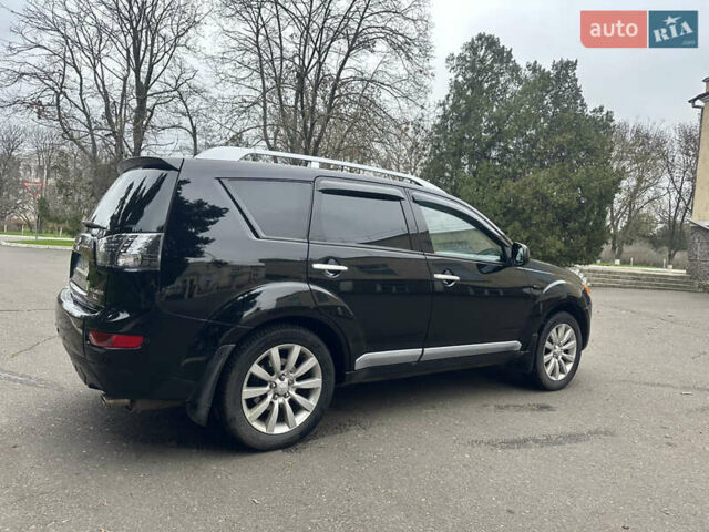 Чорний Міцубісі Аутлендер, об'ємом двигуна 2.4 л та пробігом 230 тис. км за 8300 $, фото 12 на Automoto.ua