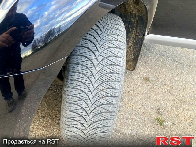 Черный Мицубиси Аутлендер, объемом двигателя 2 л и пробегом 207 тыс. км за 8100 $, фото 11 на Automoto.ua