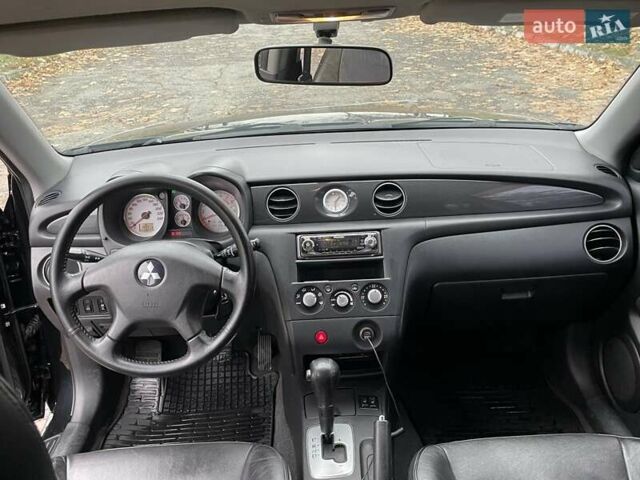 Чорний Міцубісі Аутлендер, об'ємом двигуна 2.4 л та пробігом 213 тис. км за 6850 $, фото 14 на Automoto.ua