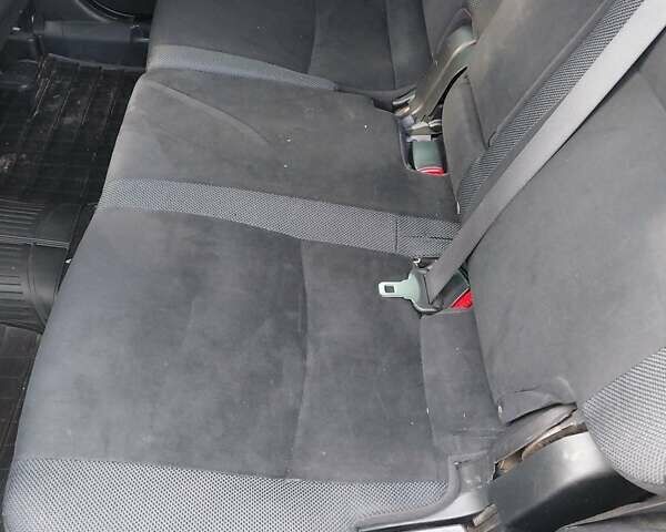 Чорний Міцубісі Аутлендер, об'ємом двигуна 1.97 л та пробігом 350 тис. км за 7888 $, фото 6 на Automoto.ua