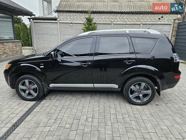 Черный Мицубиси Аутлендер, объемом двигателя 3 л и пробегом 238 тыс. км за 10800 $, фото 11 на Automoto.ua