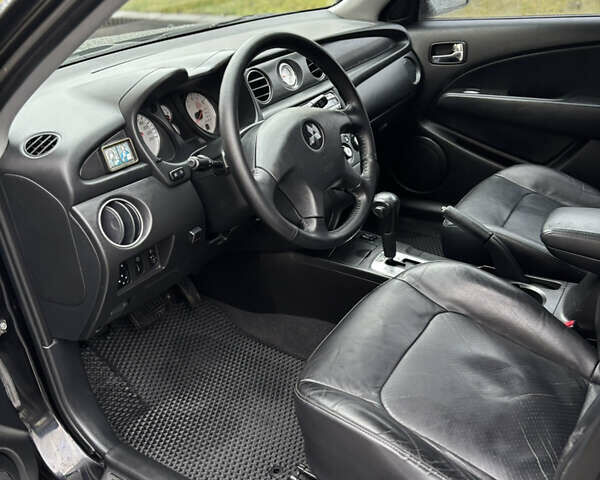 Чорний Міцубісі Аутлендер, об'ємом двигуна 2.4 л та пробігом 169 тис. км за 8000 $, фото 9 на Automoto.ua