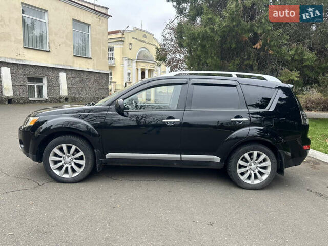 Чорний Міцубісі Аутлендер, об'ємом двигуна 2.4 л та пробігом 230 тис. км за 8300 $, фото 4 на Automoto.ua