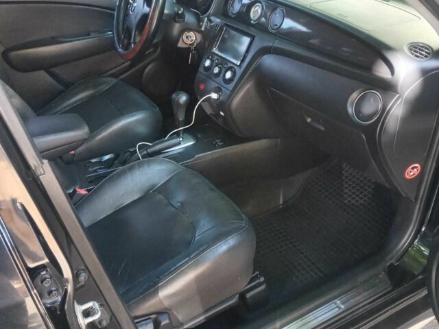 Черный Мицубиси Аутлендер, объемом двигателя 2.4 л и пробегом 248 тыс. км за 7000 $, фото 6 на Automoto.ua