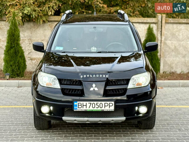 Міцубісі Аутлендер 2007 у Одесі на Automoto.ua Чорний Міцубісі Аутлендер, об'ємом двигуна 2.4 л та пробігом 201 тис. км за 7700 $, фото 39 на Automoto.ua