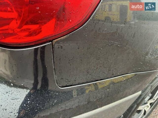 Черный Мицубиси Аутлендер, объемом двигателя 2 л и пробегом 295 тыс. км за 5300 $, фото 14 на Automoto.ua