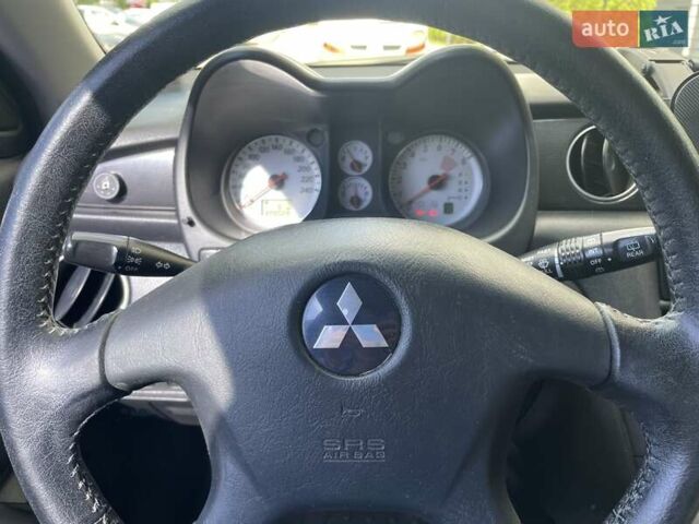 Черный Мицубиси Аутлендер, объемом двигателя 2.38 л и пробегом 310 тыс. км за 7500 $, фото 21 на Automoto.ua