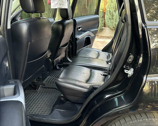 Чорний Міцубісі Аутлендер, об'ємом двигуна 3 л та пробігом 238 тис. км за 11200 $, фото 24 на Automoto.ua