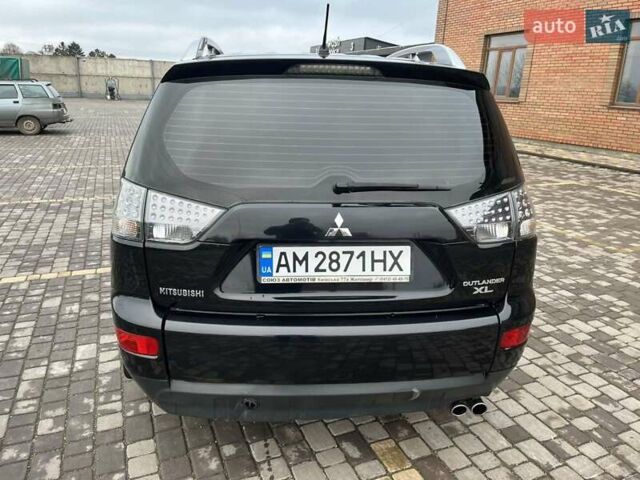 Черный Мицубиси Аутлендер, объемом двигателя 3 л и пробегом 200 тыс. км за 7999 $, фото 17 на Automoto.ua