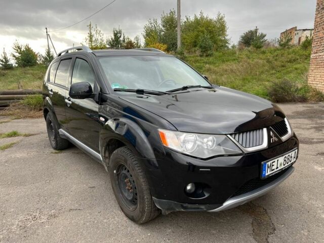 Черный Мицубиси Аутлендер, объемом двигателя 2.2 л и пробегом 190 тыс. км за 4800 $, фото 2 на Automoto.ua