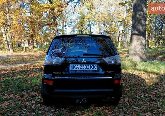 Міцубісі Аутлендер 2007 у Белой Церкве на Automoto.ua Чорний Міцубісі Аутлендер, об'ємом двигуна 3 л та пробігом 230 тис. км за 8800 $, фото 2 на Automoto.ua