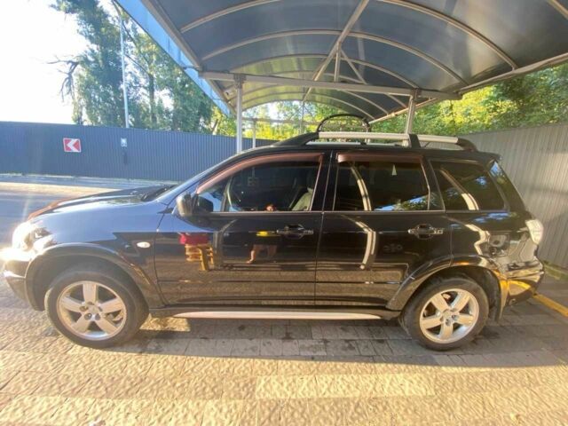 Черный Мицубиси Аутлендер, объемом двигателя 2.4 л и пробегом 219 тыс. км за 6500 $, фото 4 на Automoto.ua