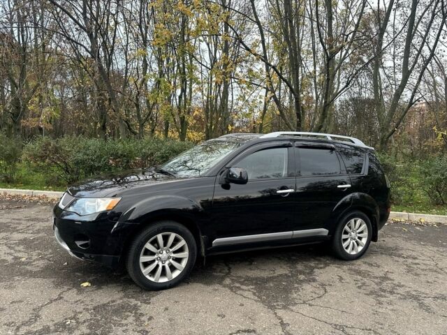 Черный Мицубиси Аутлендер, объемом двигателя 2.4 л и пробегом 230 тыс. км за 8500 $, фото 4 на Automoto.ua