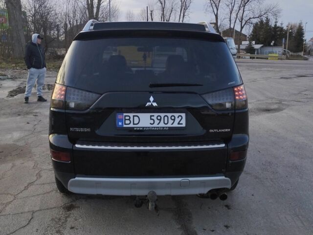 Черный Мицубиси Аутлендер, объемом двигателя 2 л и пробегом 290 тыс. км за 4900 $, фото 4 на Automoto.ua