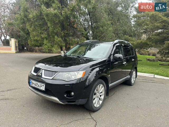 Чорний Міцубісі Аутлендер, об'ємом двигуна 2.4 л та пробігом 230 тис. км за 8300 $, фото 2 на Automoto.ua