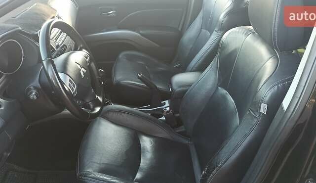 Черный Мицубиси Аутлендер, объемом двигателя 1.97 л и пробегом 244 тыс. км за 9000 $, фото 12 на Automoto.ua