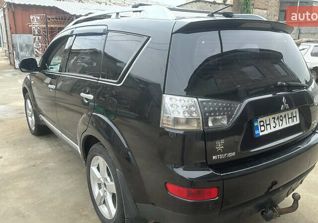 Міцубісі Аутлендер 2007 у Измаиле на Automoto.ua Чорний Міцубісі Аутлендер, об'ємом двигуна 2.36 л та пробігом 240 тис. км за 8500 $, фото 5 на Automoto.ua