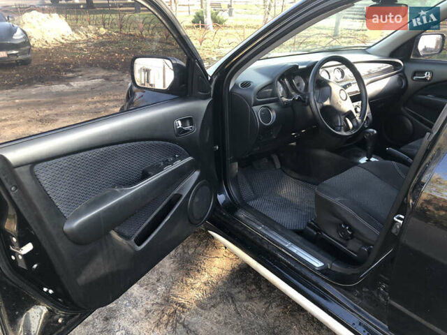 Черный Мицубиси Аутлендер, объемом двигателя 2.4 л и пробегом 260 тыс. км за 7200 $, фото 16 на Automoto.ua