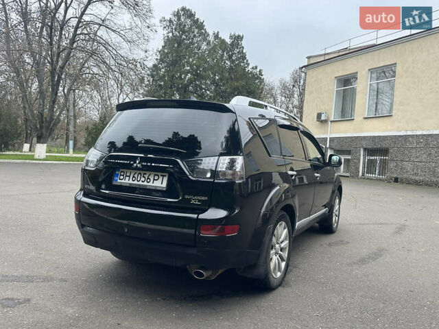 Чорний Міцубісі Аутлендер, об'ємом двигуна 2.4 л та пробігом 230 тис. км за 8300 $, фото 9 на Automoto.ua