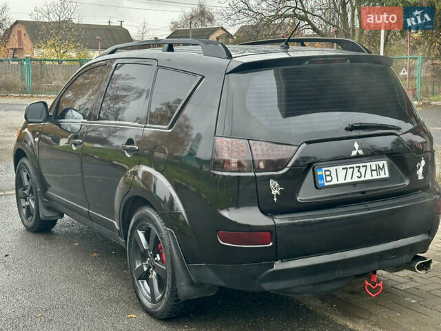 Чорний Міцубісі Аутлендер, об'ємом двигуна 3 л та пробігом 201 тис. км за 8700 $, фото 7 на Automoto.ua