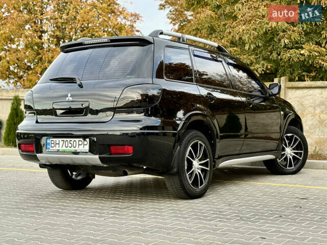 Міцубісі Аутлендер 2007 у Одесі на Automoto.ua Чорний Міцубісі Аутлендер, об'ємом двигуна 2.4 л та пробігом 201 тис. км за 7700 $, фото 6 на Automoto.ua