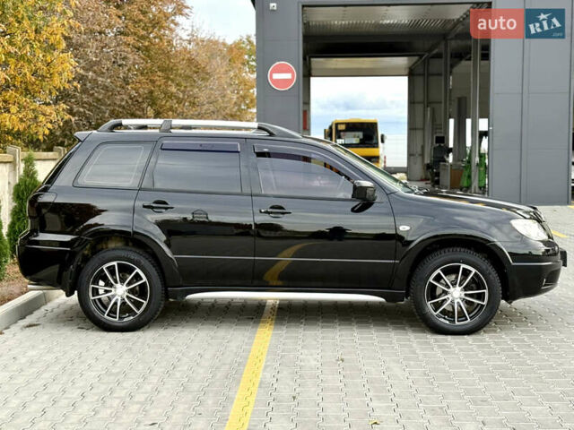 Міцубісі Аутлендер 2007 у Одесі на Automoto.ua Чорний Міцубісі Аутлендер, об'ємом двигуна 2.4 л та пробігом 201 тис. км за 7700 $, фото 5 на Automoto.ua