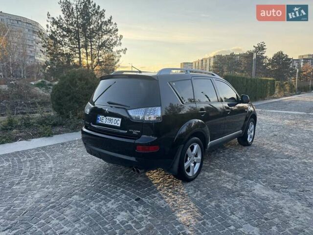 Черный Мицубиси Аутлендер, объемом двигателя 3 л и пробегом 205 тыс. км за 11300 $, фото 4 на Automoto.ua