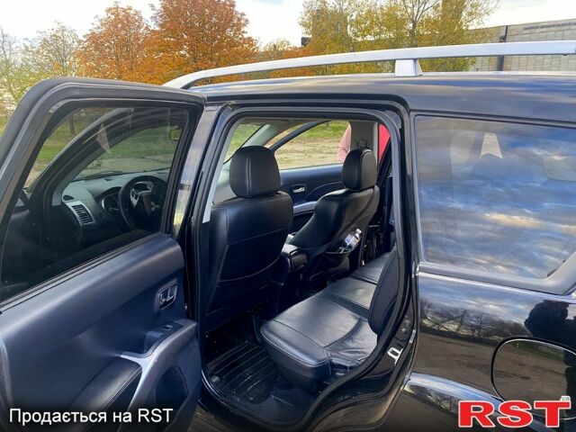 Черный Мицубиси Аутлендер, объемом двигателя 2 л и пробегом 207 тыс. км за 8100 $, фото 6 на Automoto.ua