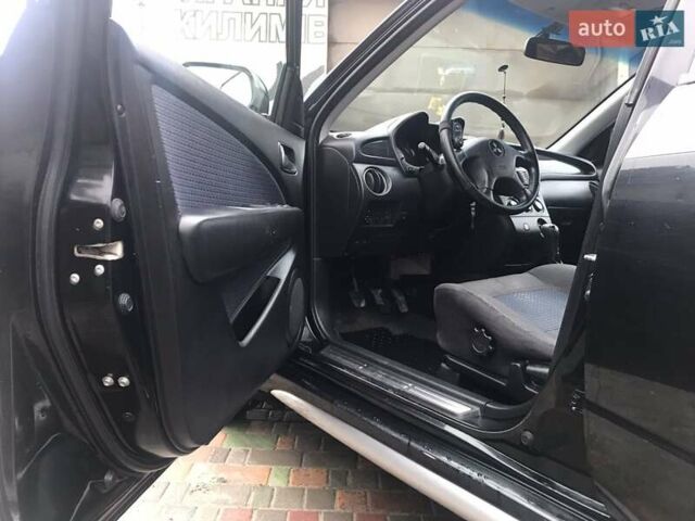 Черный Мицубиси Аутлендер, объемом двигателя 2 л и пробегом 284 тыс. км за 4999 $, фото 3 на Automoto.ua