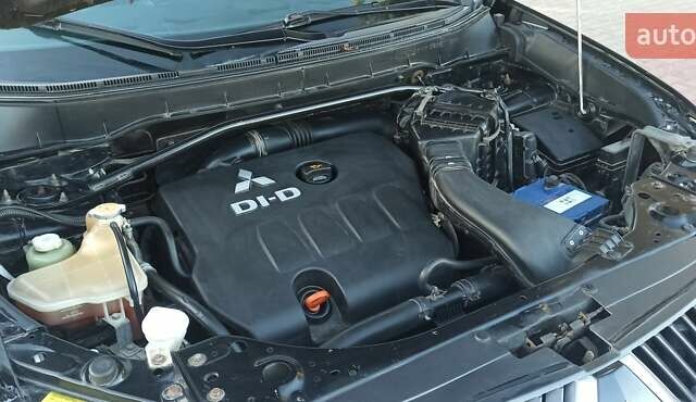 Черный Мицубиси Аутлендер, объемом двигателя 1.97 л и пробегом 244 тыс. км за 9000 $, фото 28 на Automoto.ua