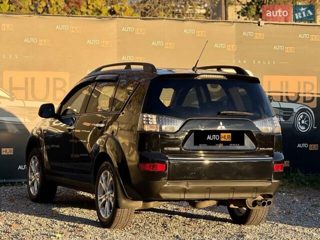 Черный Мицубиси Аутлендер, объемом двигателя 3 л и пробегом 198 тыс. км за 9500 $, фото 4 на Automoto.ua