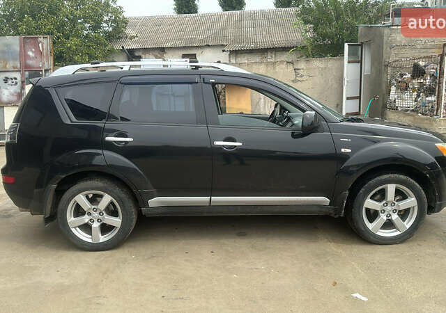 Міцубісі Аутлендер 2007 у Измаиле на Automoto.ua Чорний Міцубісі Аутлендер, об'ємом двигуна 2.36 л та пробігом 240 тис. км за 8500 $, фото 6 на Automoto.ua