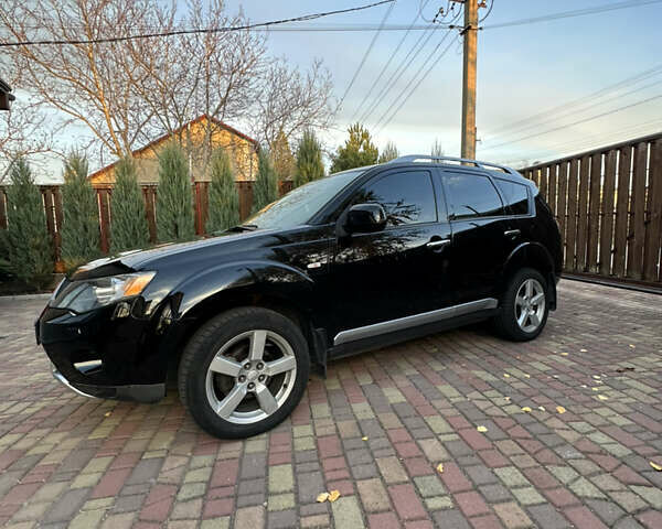Чорний Міцубісі Аутлендер, об'ємом двигуна 3 л та пробігом 238 тис. км за 11200 $, фото 5 на Automoto.ua