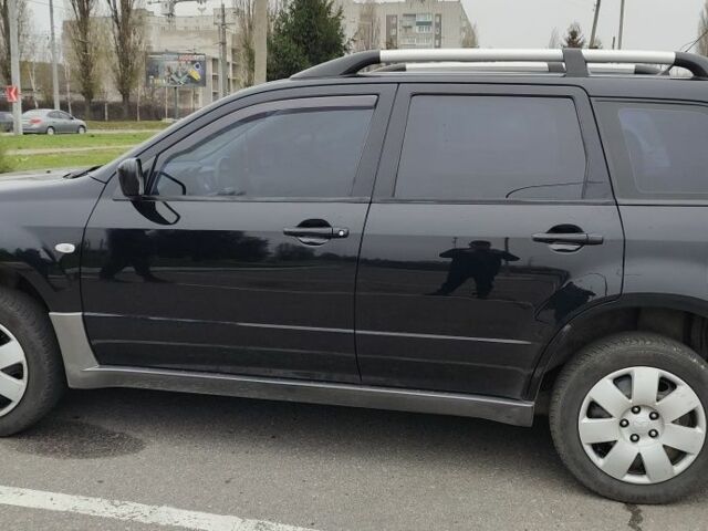 Чорний Міцубісі Аутлендер, об'ємом двигуна 2 л та пробігом 175 тис. км за 7800 $, фото 3 на Automoto.ua