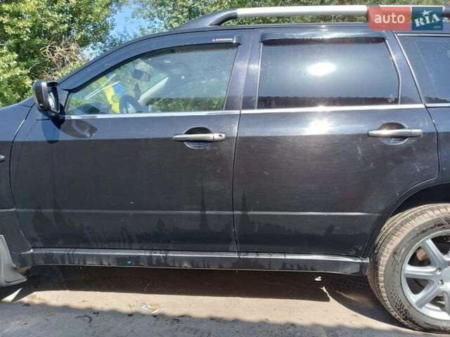 Чорний Міцубісі Аутлендер, об'ємом двигуна 2 л та пробігом 290 тис. км за 6350 $, фото 6 на Automoto.ua