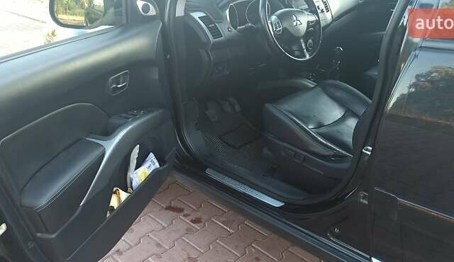 Черный Мицубиси Аутлендер, объемом двигателя 1.97 л и пробегом 244 тыс. км за 9000 $, фото 10 на Automoto.ua