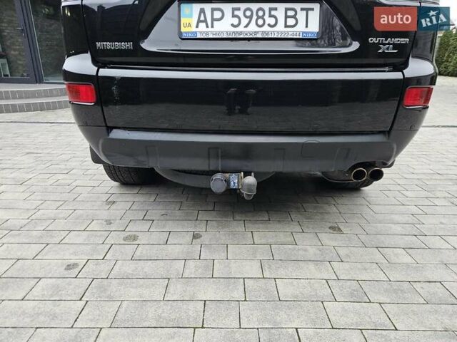 Черный Мицубиси Аутлендер, объемом двигателя 3 л и пробегом 238 тыс. км за 10800 $, фото 8 на Automoto.ua