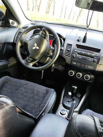 Черный Мицубиси Аутлендер, объемом двигателя 3 л и пробегом 190 тыс. км за 10000 $, фото 22 на Automoto.ua