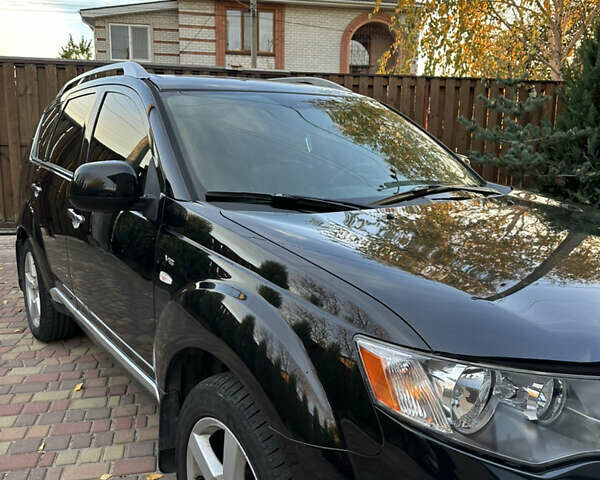 Чорний Міцубісі Аутлендер, об'ємом двигуна 3 л та пробігом 238 тис. км за 11200 $, фото 8 на Automoto.ua