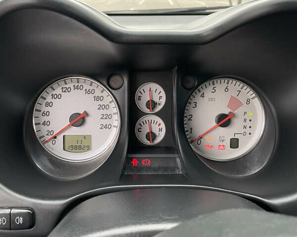 Чорний Міцубісі Аутлендер, об'ємом двигуна 2.38 л та пробігом 198 тис. км за 7100 $, фото 10 на Automoto.ua