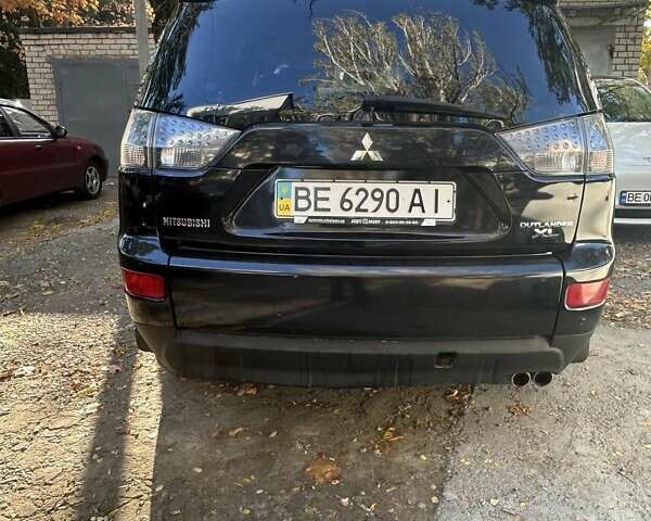 Міцубісі Аутлендер 2007 у Миколаєві на Automoto.ua Чорний Міцубісі Аутлендер, об'ємом двигуна 3 л та пробігом 265 тис. км за 7200 $, фото 5 на Automoto.ua
