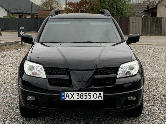 Міцубісі Аутлендер 2007 у Харкові на Automoto.ua Чорний Міцубісі Аутлендер, об'ємом двигуна 2.4 л та пробігом 240 тис. км за 5600 $, фото 2 на Automoto.ua