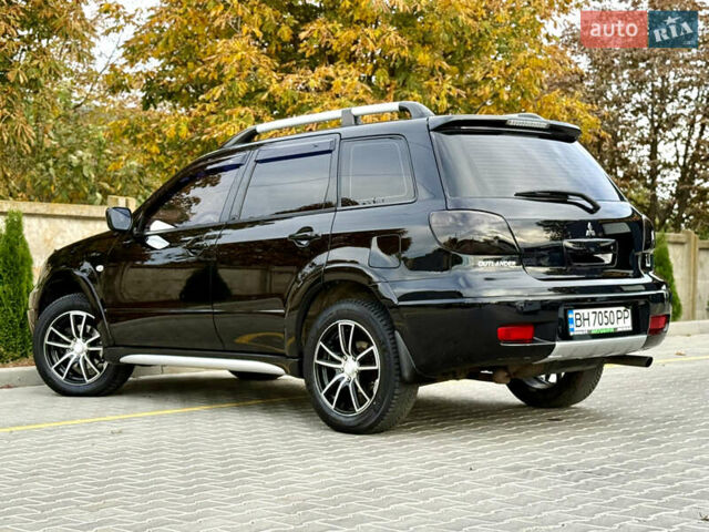 Міцубісі Аутлендер 2007 у Одесі на Automoto.ua Чорний Міцубісі Аутлендер, об'ємом двигуна 2.4 л та пробігом 201 тис. км за 7700 $, фото 20 на Automoto.ua