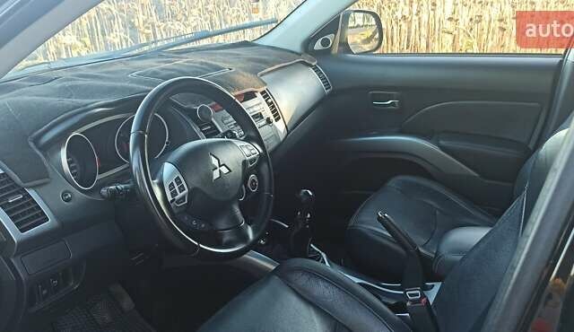 Черный Мицубиси Аутлендер, объемом двигателя 1.97 л и пробегом 244 тыс. км за 9000 $, фото 11 на Automoto.ua