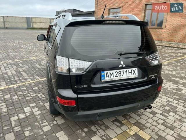 Черный Мицубиси Аутлендер, объемом двигателя 3 л и пробегом 200 тыс. км за 7999 $, фото 12 на Automoto.ua