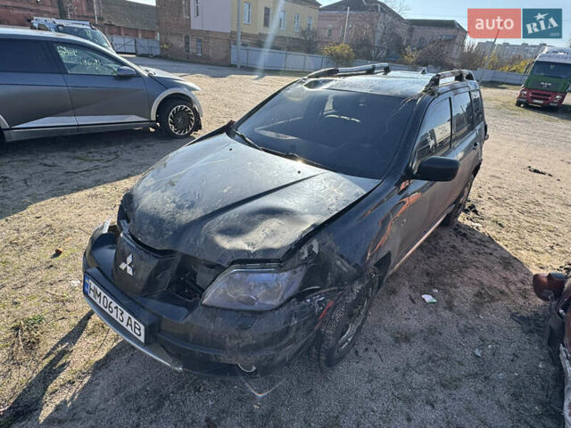 Черный Мицубиси Аутлендер, объемом двигателя 2 л и пробегом 258 тыс. км за 2200 $, фото 10 на Automoto.ua