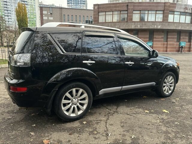 Черный Мицубиси Аутлендер, объемом двигателя 2.4 л и пробегом 230 тыс. км за 8500 $, фото 7 на Automoto.ua