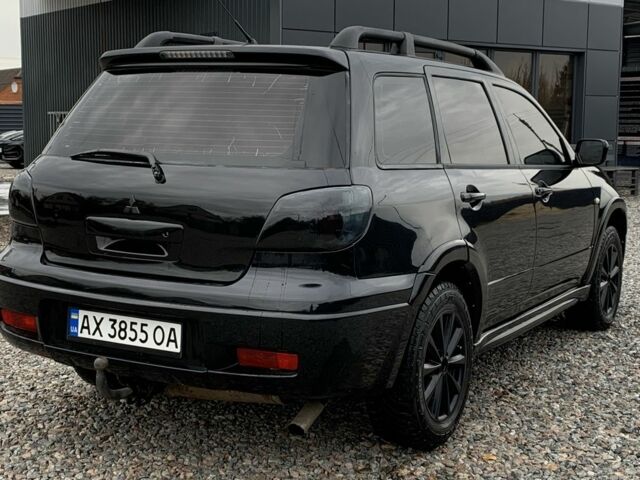 Міцубісі Аутлендер 2007 у Харкові на Automoto.ua Чорний Міцубісі Аутлендер, об'ємом двигуна 2.4 л та пробігом 240 тис. км за 5600 $, фото 4 на Automoto.ua
