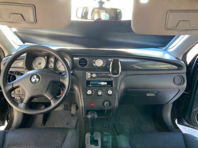 Черный Мицубиси Аутлендер, объемом двигателя 2.4 л и пробегом 219 тыс. км за 6500 $, фото 8 на Automoto.ua