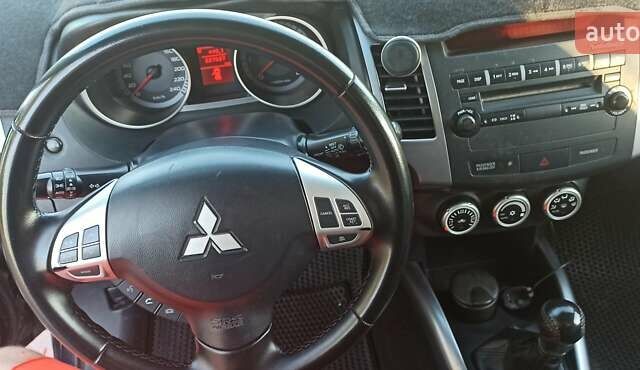 Черный Мицубиси Аутлендер, объемом двигателя 1.97 л и пробегом 244 тыс. км за 9000 $, фото 14 на Automoto.ua